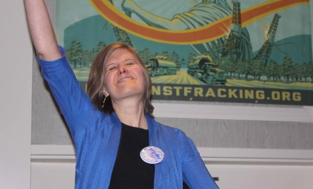 Sandra Steingrabber embraces anti-fracking victory at Albany Rally, January 2015 -Photo by Jay Burney
