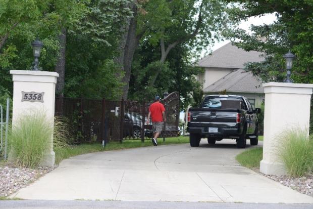 Catering arrives at Pat Kane's house for his day with the Stanley Cup.
