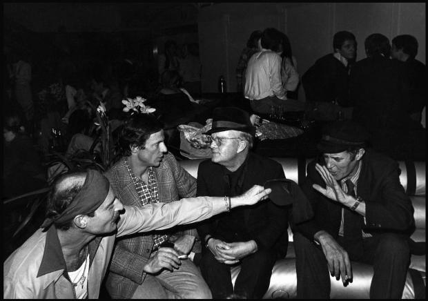 Truman Capote with Peter Beard at Studio 54 during Beard’s 40th birthday party.&nbsp;
