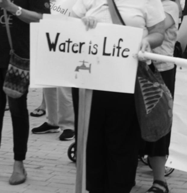 A true message&nbsp;held up by a demonstrator at a September rally at Niagara Square during the Rise Up For Climate Justice campaign.
