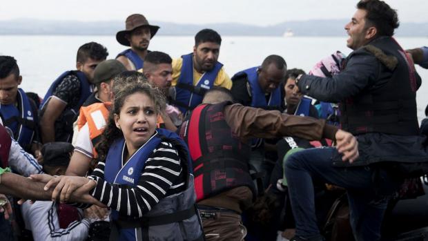 Syrian refugees arrive on a dinghy after crossing from Turkey to Lesbos island, Greece, September 9, 2015. Photo courtesu of Freedom House.
