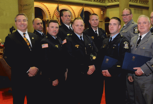 Dave DiPietro (left) with a bunch of his buddies with guns.
