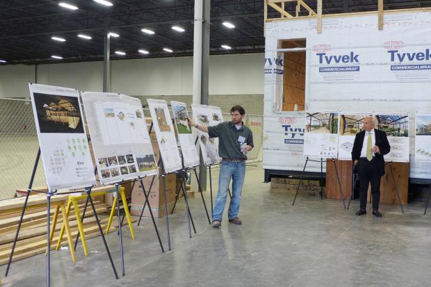 University at Buffalo School of Architecture and Planning student, and GRoW Home design team member, Chris Osterhoudt explains the building plans for the school's entry into the Solar Decathlon in October of 2015. Photo: Nancy J. Parisi
