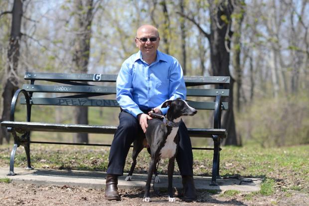 Vladislav Sandler at Delaware Park with his dog. Photo by Nancy J. Parisi.
