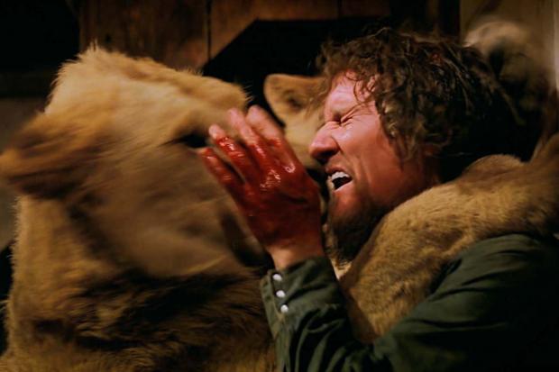 Hank (Noel Marshall) receives a “kiss” from one of the lions in Drafthouse Films’ / Olive Films’ release of Roar. Courtesy of Drafthouse Films / Olive Films.
