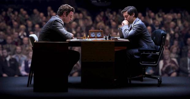 Liev Schreiber as Boris Spassky and Tobey Maguire as Bobby Fisher in Pawn Sacrifice.
