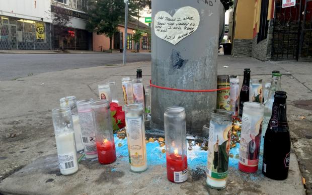 A memorial to Myron Kemp stands at intersection of Grant and Breckenridge streets, where Kemp was shot and killed last week.&nbsp;
