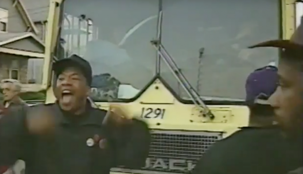 A much younger Charley Fisher, about to lie down in front of a city garbage truck to protest the city's user fees.
