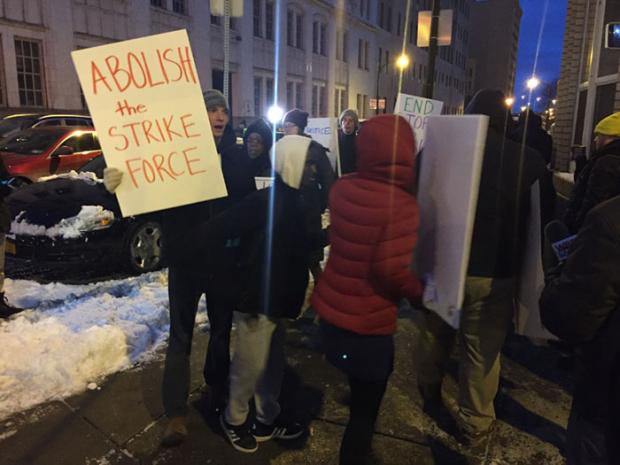 Protestors march outside BPD Headquarters on December 13.
