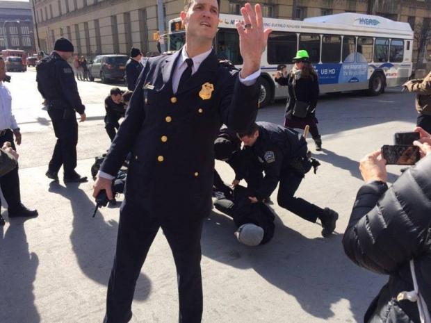 Police arrest activists protesting Mayor Brown's State of the City speech on February 17.&nbsp;
