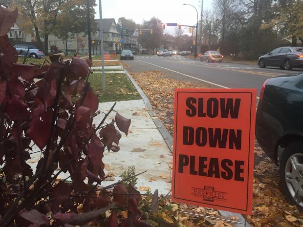 A lawn sign at the "Parkside Curve," long a dangerous stretch of road for motorists, pedestrians, and lawns.
