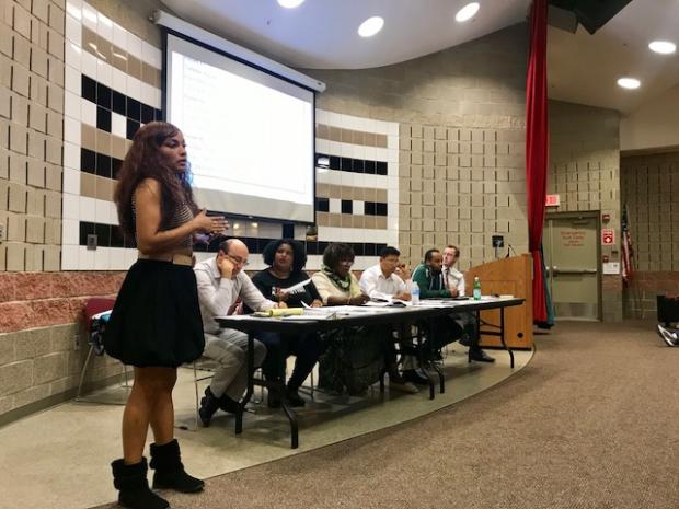 Yasmin Young, a member of the Buffalo Police Advisory Committee, addresses a community meeting Tuesday night at the Frank E. Merriweather, Jr. Library. Photo by Cathleen Draper.
