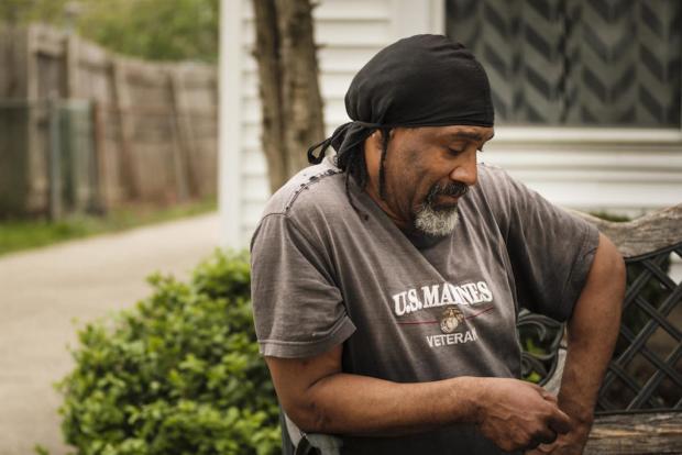 Marine Corps veteran Reginald Holloway filed two housing discrimination complaints with the city, the first more than a decade ago, to no avail. Last week Buffalo's Common Council promised to take action on fair housing law enforcement this fall. Photo by Joed Viera.
