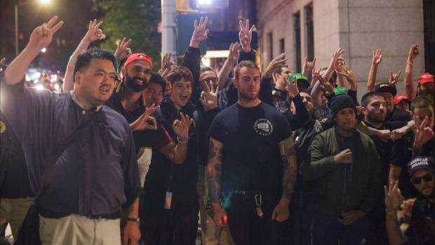 Proud Boys posing Friday outside New York City's Metropolitan Republican Club.&nbsp;(Photo credit: Twitter @HuntedHorse.)
