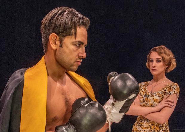 Anthony Alcocer as young boxer Joe Bonaparte and Cassie Cameron as love interest Lorna Moon in Golden Boy. Photo by Gene Witkowski.
