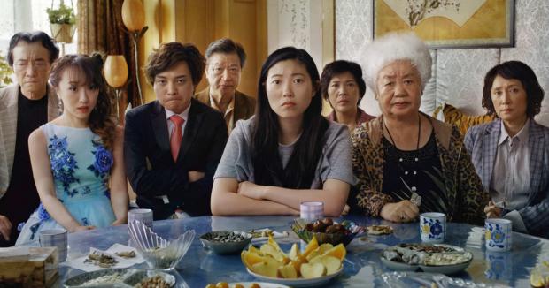 Awkwafina (center) heads the cast of The Farewell.
