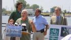 Justin Booth, GoBike founder; Jay Burney, Outer Harbor advocate; Regional President Empire State Development (New York State); and New York State Assemblyman Sean Ryan announcing the new Bike and Pedestrian Ferry for the Outer Harbor in 2014.
